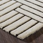 Renwil Arctica Ivory and Black Wool Rug 9 ft 10 in x 13 ft 1 in RARC-10182-1013 - close-up of hand-tufted wool and rug edge