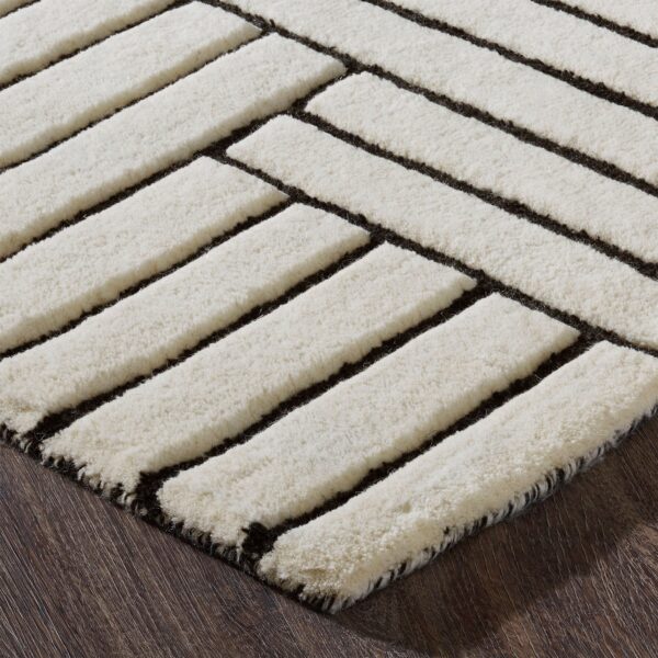 Renwil Arctica Ivory and Black Wool Rug 9 ft 10 in x 13 ft 1 in RARC-10182-1013 - close-up of hand-tufted wool and rug edge