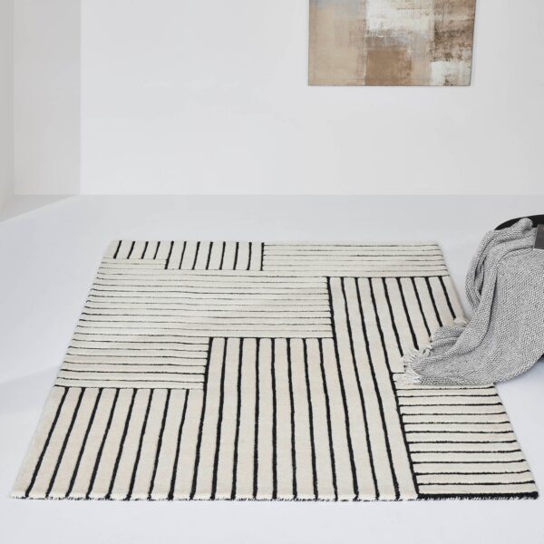 Renwil Arctica Ivory and Black Wool Rug 9 ft 10 in x 13 ft 1 in RARC-10182-1013 - Arctica rug styled in a bedroom
