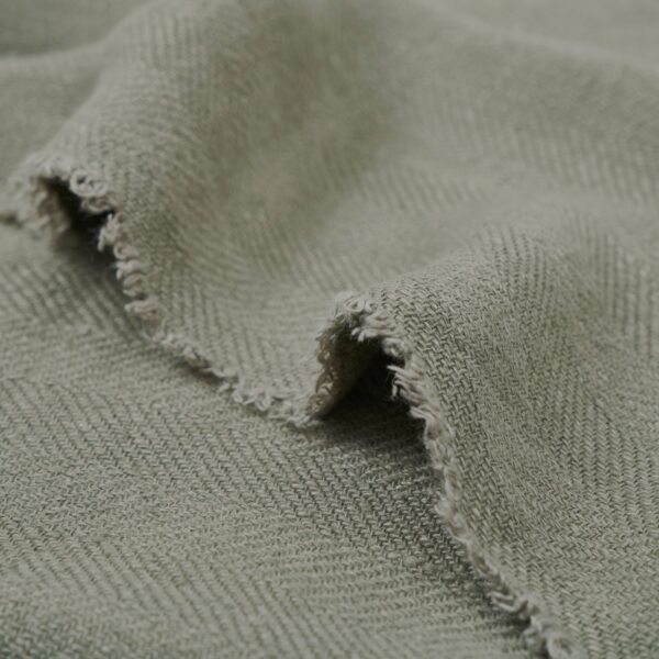 Renwil Vernier Dark Green Linen Throw 70 x 50 THR1014 - close-up of frayed linen edge