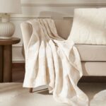 Renwil Grandi Ivory and Cream Checkerboard Cotton Throw 70 x 50 — Grandi throw styled with a chair