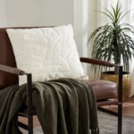Renwil Merano Ivory Embroidered Cotton Pillow 20 x 20 PWFL1466 - ivory pillow styled on a chair