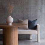 Renwil Lamoureux Textured Ivory Ceramic Vase — vase styled with dried stems beside a sofa; accessories not included