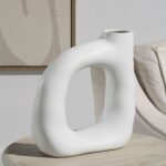 Renwil Vostra Vase VAS291 — vase styled on a side table