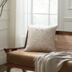 Renwil Amal Neutral Two-Tone Handwoven Pillow 20 x 20 PWFL1471 - Amal pillow styled on a wooden chair
