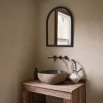 Renwil Olfito Matte Black Pine Arch Mirror MT2715 - styled arch mirror above a vanity