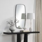 Renwil Nicoya Dark Bronze Shaped Wall Mirror MT2713 - styled wall mirror above a black console