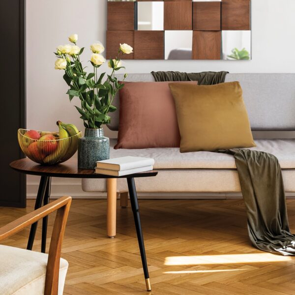 Renwil Claudia Rust Poly-Velvet Pillow 24 x 24 PWFL1328 - rust accent pillow styled on a sofa