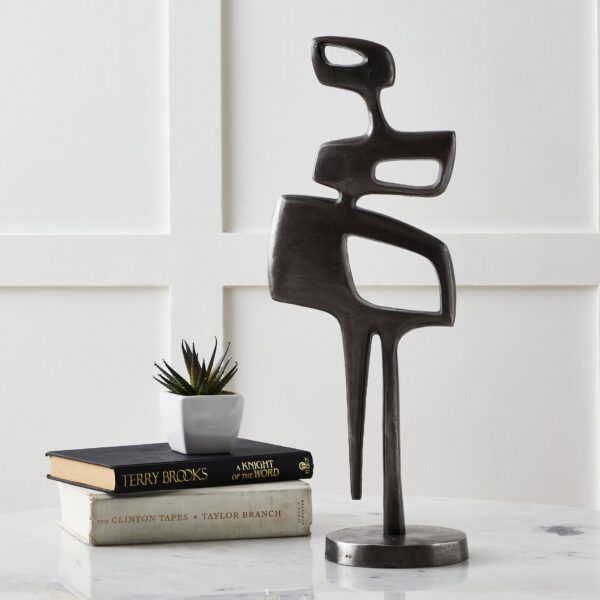 Renwil Pacino Decorative Sculpture — styled on a console beside books