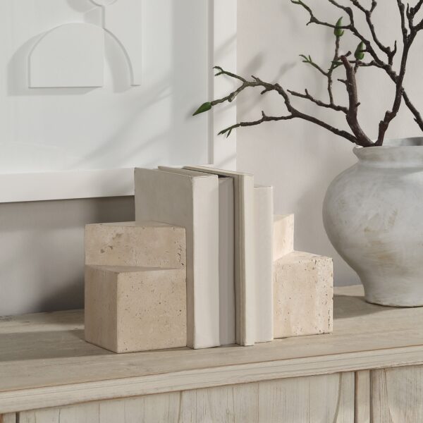 Renwil Attle Travertine Bookends - Set of 2 — styled supporting books on a console