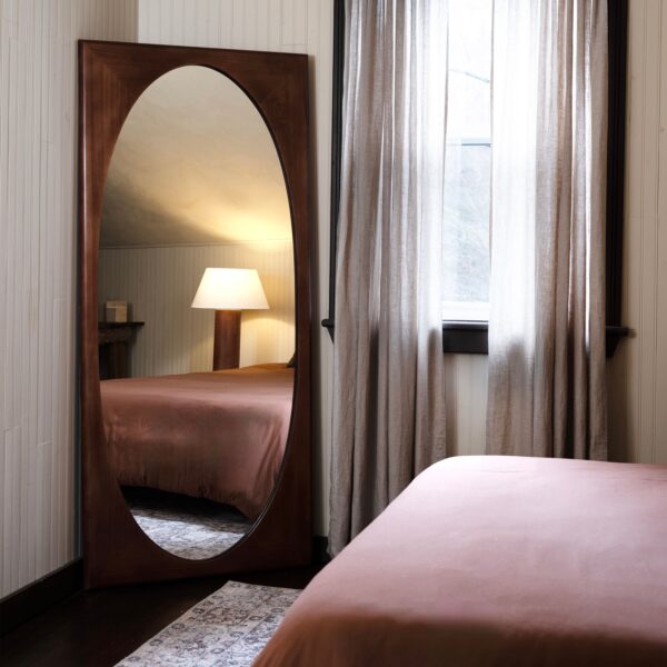 Renwil Sitia Walnut Finish Pine Full Length Mirror MT2698 - full length mirror styled leaning in a bedroom