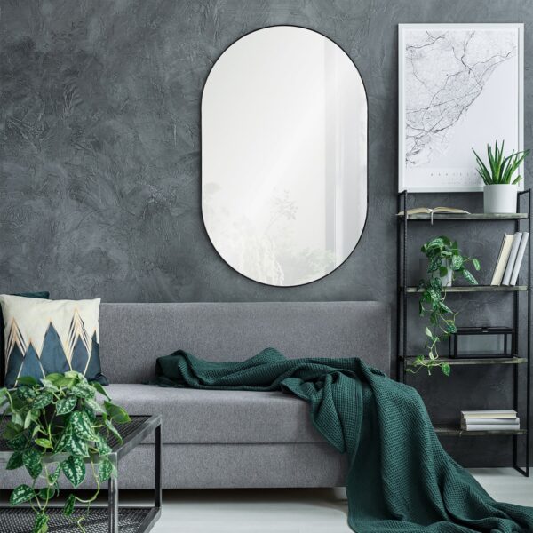 Renwil Webster Black Iron Oval Wall Mirror MT2394 - mirror styled above a sofa