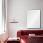 Renwil Raizel Matte Black Iron Wall Mirror MT2345 - mirror styled above a red sofa