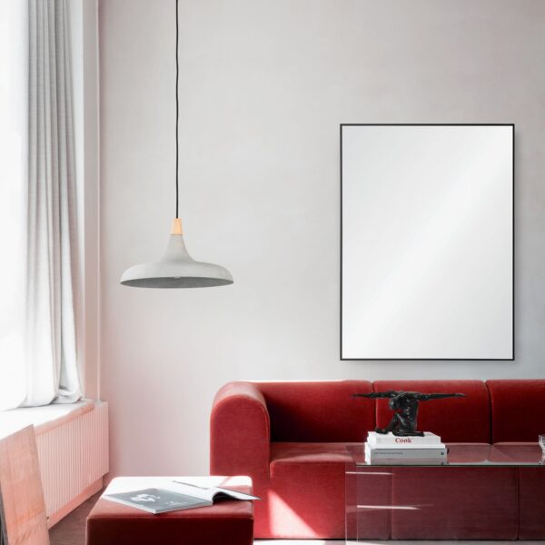 Renwil Raizel Matte Black Iron Wall Mirror MT2345 - mirror styled above a red sofa