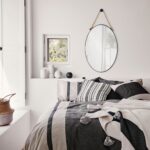 Renwil Parbuckle Black Oval Wall Mirror with Hemp Rope MT2365 - mirror styled above a bed