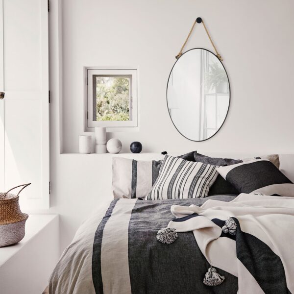 Renwil Parbuckle Black Oval Wall Mirror with Hemp Rope MT2365 - mirror styled above a bed