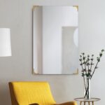 Renwil Eros Antique Brass Corner Wall Mirror MT2418 - mirror styled above an accent chair