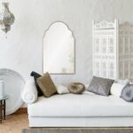 Renwil Natasha Antique Gold Leaf Arched Wall Mirror MT2364 - mirror styled above a white sofa