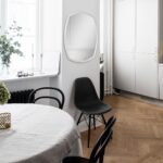 Renwil Spalding Beveled Frameless Shaped Wall Mirror MT950 - mirror styled in a bedroom