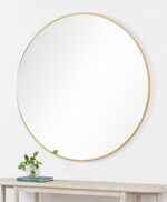 Renwil Fragoso Large Gold Round Wall Mirror MT2532 - large gold wall mirror styled above a console