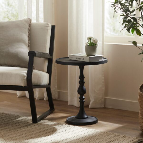 Renwil Yates Black Cast Aluminum Accent Table — table styled beside a chair; accessories not included