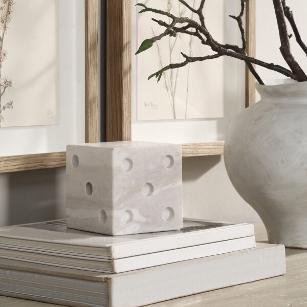 Renwil Dylon Marble Dice Sculpture — styled on books beside a vase