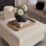 Renwil Mango Wood Tray — styled on an ottoman with books and a vase