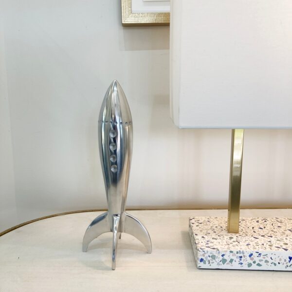 Renwil Rush Decorative Sculpture STA432 — silver rocket sculpture styled on a console