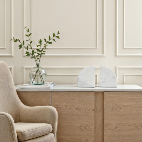 Renwil Kaleido Marble Bookends - Set of 2 — styled on a console with books and a vase